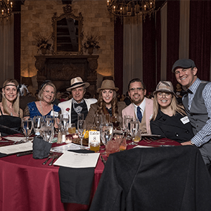 Atlanta Murder Mystery party guests at the table