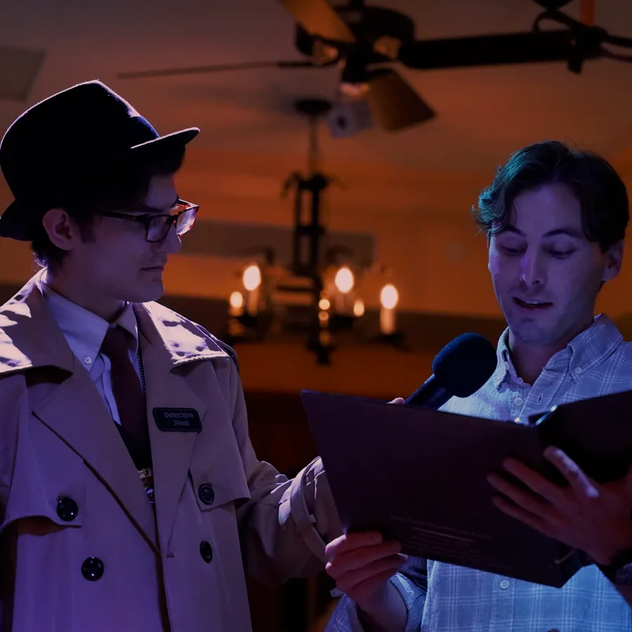 Professional actors performing at a Atlanta murder mystery