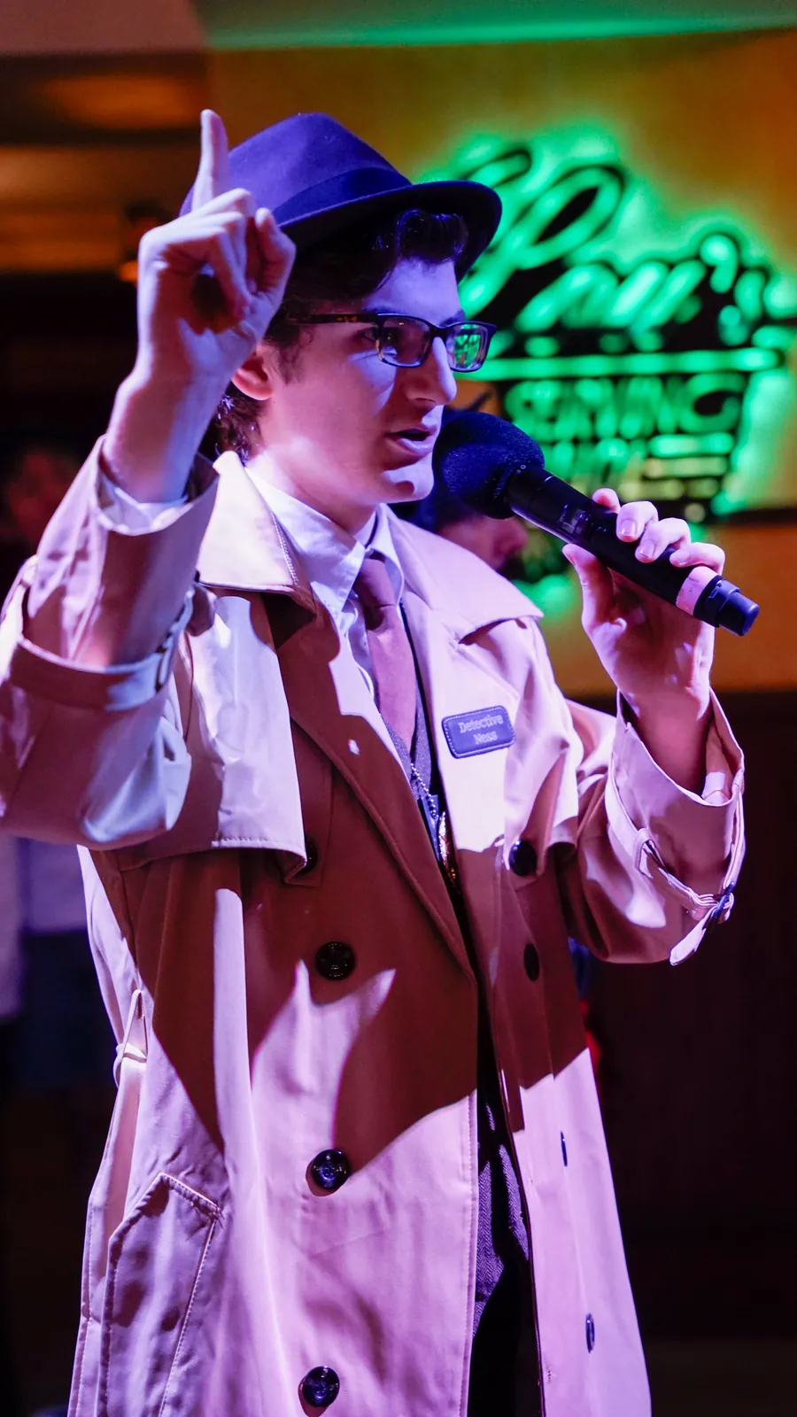 A Murder Mystery Company actor working the room at a Atlanta show