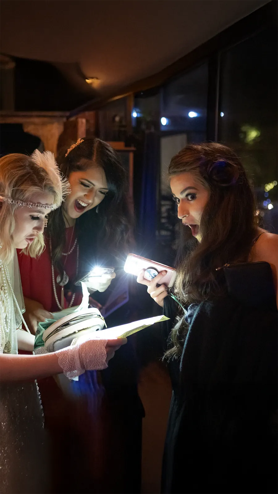 Guests at a Murder Mystery Company public dinner show in Atlanta